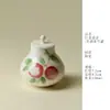 Rinno Gui Song Cerámica Porcelana Transparente Esmalte Bajo Pastel Lichi Mini Recipiente para Té Sellado Creativo de Alto Valor Recipiente a Prueba de Humedad