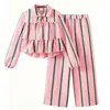 Conjunto transfronterizo europeo y americano para niña de AliExpress: conjunto de dos piezas para niños mayores, camisa de encaje a rayas con cuello y pantalón largo de color contrastante, estilo moderno