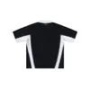 Camisa tipo polo deportiva retro de retazos en blanco y negro con mangas raglán acanaladas, corte holgado, cuello camisero, top casual para estudiantes hombres y mujeres