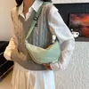 Bolsa esportiva externa em formato de bolinho transfronteiriça, bolsa transversal de nylon simples e casual para mulheres, leve para passeios, deslocamentos e ciclismo