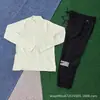 Traje de Otoño e Invierno 2025 Nuevo Pantalones de Seda Helada de Secado Rápido Chaqueta Deportiva Casual con Cremallera y Capucha Ropa de Protección Solar para Hombres y Mujeres Tendencia