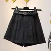 Pantalones cortos de pana casual para mujer otoño e invierno 2025 nuevos caqui prendas de abrigo cintura alta adelgazantes falda pantalón línea A pantalones de pierna ancha bootcut