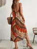 Vestido de tirantes bohemio estampado estilo resort europeo y americano para mujer, sin mangas, holgado, adelgazante, elegante, de longitud media, venta al por mayor