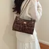 2026 Nuevo Otoño Moda Simple Súper Caliente Bolso de un Hombro Lujo Ligero Bolso Tote con Cadena Mate Estampado de Leopardo Bolso para el Trabajo
