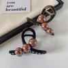 Estilo coreano elegante pérola grampo de cabelo feminino Retro marrom High-end Sentido Voltar Cabeça Agarrar Clipe Tubarão Elegante Cocar