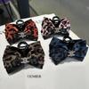 Moda coreana sentido de alta gama lazo cara sonriente pinza para el cabello pinza grande de agarre moda leopardo retro diamante cabello atrás
