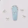 Accesorios Populares para Uñas con Forma de Lazo, Decoraciones Metálicas Pequeñas en Forma de Lazo para Uñas Tridimensionales, Pegatinas Metálicas para Uñas de Aleación al por Mayor