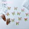 Accesorios de uñas de mariposa populares en línea, accesorios de uñas luminosos de mariposa de dos colores de celebridades, accesorios de resina de mariposa pequeña tridimensional.