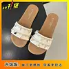 Chanclas Planas Casuales con Zapatos de Falda para Mujer Ropa de Exterior de Verano 2025 Nuevo Estilo de Centro Turístico Costero Sandalias de Tira Cruzada