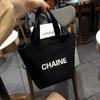 Bolsa de lona temperamental 2024 novo estilo pequena bolsa para sair bolsa de mamãe bolsa de mão feminina ins bolsa pequena da moda