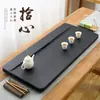 Bandeja de té de piedra Wujin natural juego Mesa de té de piedra entera Oficina simple Hogar Tamaño grande pequeño Bandeja de té en stock Venta al por mayor