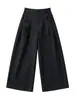 Calça de terno cinza escuro com caimento sofisticado, nova coleção outono 2026 feminina, cintura alta, solta, casual, plissada, perna larga
