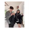 Ropa de punto de medio cierre para Otoño e Invierno Pareja Gris Estilo Coreano Tendencia Estilo Perezoso Suéter de punto de cuello medio holgado Tendencia