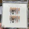 Transformación de Mariposa Taoxili Estilo Chica Caliente Estampado de Leopardo Pintado a Mano Blanco Francés Mariposa 3D en Relieve Cadena Cinta Uñas Portátiles
