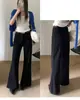 Pantalones vaqueros de otoño TOP estilo europeo Guangzhou Trece Líneas coreanos versátiles de bolsillo recto con elasticidad de 360 grados acampanados con cinturón 82597