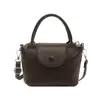 Bolsa Transversal Casual com Aba Feminina Vintage Tendência Verão 2026 Estilo Coreano Bolsa de Mão Bolsa Saco