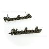 En stock pelo Hecho a mano creativo tridimensional tarjeta de pasador de metal bolsa de equipaje ropa placa de nombre de metal logo