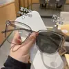 Gafas de montura degradada anti-radiación de luz azul se pueden equiparar con miopía sin graduación lente transparente fotocromática montura de gafas de sol para maquillaje sencillo montura grande