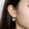 Joyería Transfronteriza Europea y Americana Diseño de Textura Plegada Pendientes de Flor Pendientes Pendientes de Flor de Cinco Pétalos de Doble Capa