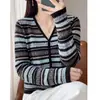 Nuevo cárdigan de punto fino de lana retro otoño/invierno 2026 manga larga jacquard Fair Isle holgado