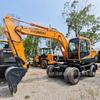 Excavadora de ruedas HYUNDA 150W-9 usada para proyecto de paisajismo municipal en buen estado