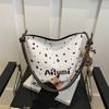 Bolsa Feminina de Inverno 2024 Nova Simples Casual Diária Versátil Moda Estilo Coreano Retrô Ombro Transversal Balde para Mulheres