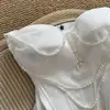 Top blanco sexy adelgazante de alta gama sin tirantes con corsé de ballenas para usar como prenda exterior
