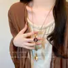 Nuevo collar largo de plumas estilo Zen chino para mujer, cadena decorativa para suéter estilo étnico vintage, accesorio de colgante bohemio