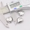 Venta al por mayor de fábrica accesorios para joyería de acero inoxidable colgante DIY 316 acero inoxidable corazón hueco colgante pequeño