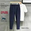 Pantalones profesionales para negocios, pantalones ajustados de moda estilo Hong Kong, ropa casual de hombre de alta gama sin planchado a la moda 2026