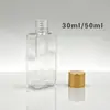 Botellas cuadradas pequeñas transparentes de 30/50 ml con tapas doradas y plateadas para dispensar aceites esenciales, champú y gel de ducha