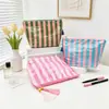Bolsa de maquillaje impermeable de PVC, nuevo modelo transfronterizo para mujer, neceser rayado de gran capacidad, bolsa de almacenamiento de viaje versátil, fábrica