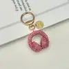 Llavero de Audífonos con Pedrería de Cristal Llavero Musical Completamente Cubierto de Pedrería Adorno Colgante de Cuerda de Diamante para Bolso Accesorios Llavero de Coche