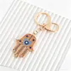 Chaveiro de Coração de Amor Criativo Transfronteiriço Olho de Diabo Cravejado de Diamante Pingente de Metal Charme para Bolsa Argola de Chaveiro Pequeno Presente Exquisito