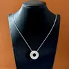 Estilo Indiferente moneda de cobre lingote forma geométrica redonda acabado cepillado destello diamante rosquilla colgante collar unisex estilo versátil