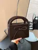 Bolsa de mão feminina minimalista estilo ins coreano 2026 nova bolsa de ombro versátil para o dia a dia com design de laço doce