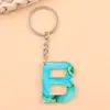 Colgantes de 26 Letras Inglesas Transfronterizos Europeos y Americanos Impresión Océano Azul Acrílico Moda Personalizada Colgante Joyería