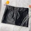 Falda Europea y Americana Transfronteriza Ceñida a la Cadera de Mujer, Mismo Estilo Chica Popular Y2K Retro Nightclub Sexy de Cintura Baja de Cuero de PU Corta Exportación