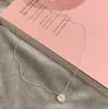 Colar Pingente Coração Cravejado com Diamantes Doce e Cool Estilo Coreano para Mulheres Design de Nicho Corrente Clavicular de Alta Qualidade Acessórios de Empilhamento Estilo Celebridade da Internet