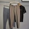 Pantalones para hombre estilo coreano modernos otoño e invierno nueva llegada pantalones recortados para hombre corte ajustado pantalones de maniquí pantalones casuales