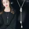 Collar largo de cadena para suéter con accesorios florales transfronterizos para mujer, colgante de borla de cristal, colgante para ropa, joyería simple al por mayor