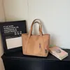 Bolso tote grande, simple y elegante, perfecto para ir al trabajo y para uso casual, ideal para estudiantes universitarios en 2026, un bolso de hombro moderno para la escuela y el uso diario