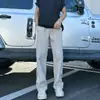 Calça comprida masculina da moda, estilo japonês, com perna inclinada e levemente alargada, perfeita para outono e inverno, com uma estética high-street americana que faz você parecer mais alto e magro, uma calça longa fashion e casual