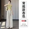 Foto real de los nuevos pantalones anchos de verano 2026 de Tencel y lino, pantalones casuales de cintura alta adelgazantes, pantalones de traje rectos de seda helada para mujer