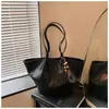 Bolsa de mano grande transfronteriza para mujer, nueva moda otoño 2026, bolso de hombro, elegante y versátil para el trabajo y los desplazamientos