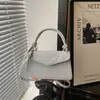 Bolso de Mujer Estilo Coreano Personalizado de Moda para el Trabajo Nuevo Estilo 2026 Bolso Cuadrado Pequeño de Temperamento a la Moda para Hombro Cruzado de Mano para Mujeres