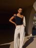 Amazon transfronterizo moda europea y americana superventas estilo europeo y americano ropa de mujer diseño sensación hombro irregular top tubo verano