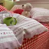 Nuevo juego de cuatro piezas de gasa de doble capa, funda de edredón amigable con la piel, juego de tres piezas para dormitorio de estudiante, funda de almohada y sábana para el hogar
