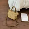 Bolso casual para el día a día, bolso de mano para mujer, nuevo bolso tipo cubo de estilo coreano, ligero y de diseño único, bolso de hombro y bolso cruzado elegante