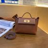 2424Mini Bolsa Kelly Couro Bovino de Primeira Camada Bolsa Asa Moda Casual Bolsa Bolinho Estilo Europeu e Americano com Fecho